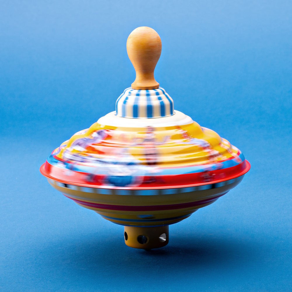 Push-Powered Humming Top